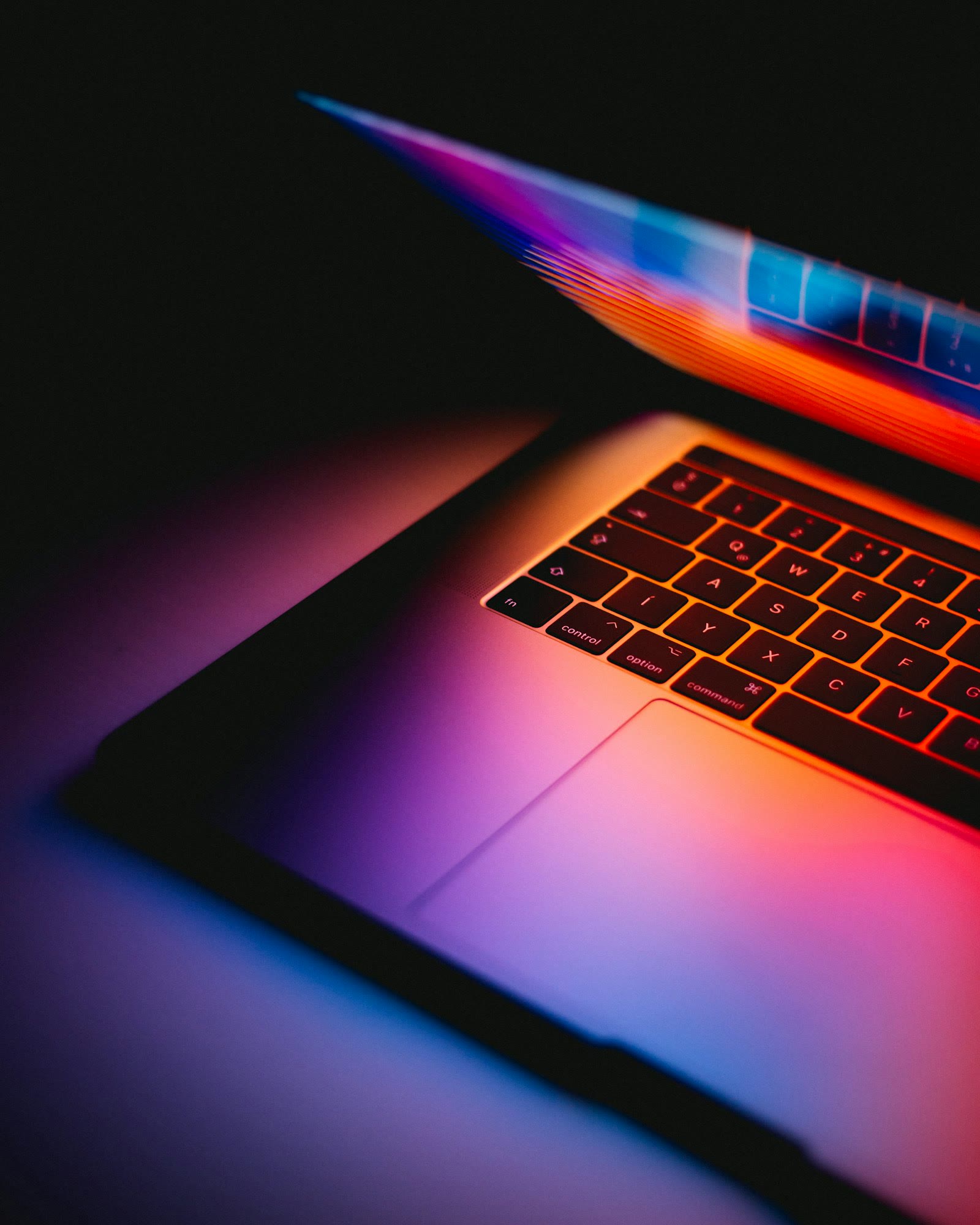 A laptop open on a desk